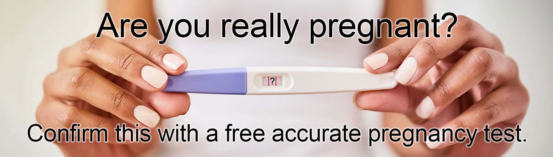Woman holding a pregnancy test and needs a free pregnancy test in Virginia.